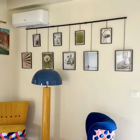 Панно для фотографий Umbra Exhibit с 9 рамками, черное