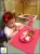 Детская тарелка и коврик 2в1 EZPZ Happy Mat, коралловая
