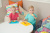 Детская тарелка с ковриком EZPZ Happy Bowl Care Bear (желтая)